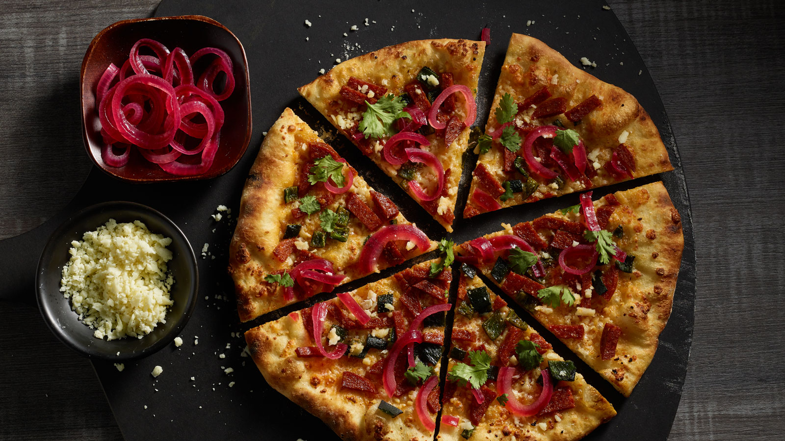 Chorizo and Roasted Poblano Pizza with Pickled Red Onions